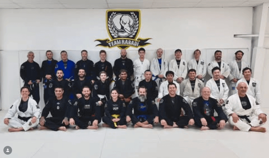 Team Rabadi group photo — blue belt promotion