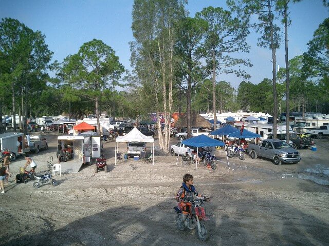 Vlad on a dirt bike at the track